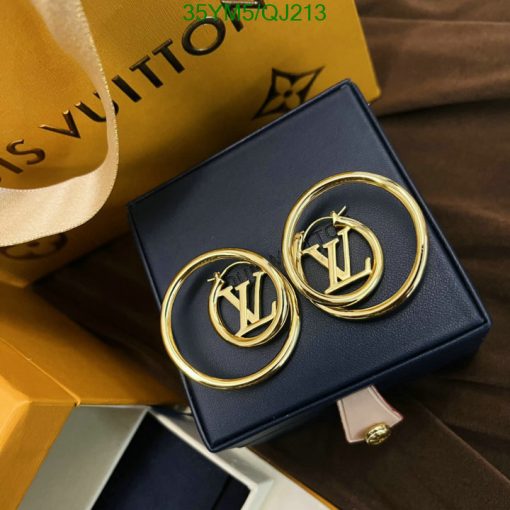 Designer logo earrings on blue box with packaging.