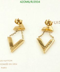 Gold Louis Vuitton logo earrings on white background.