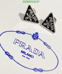 Prada Milano cufflinks on branded package.