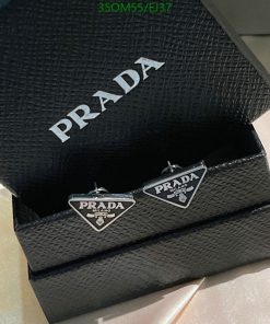 Prada earrings in branded box.