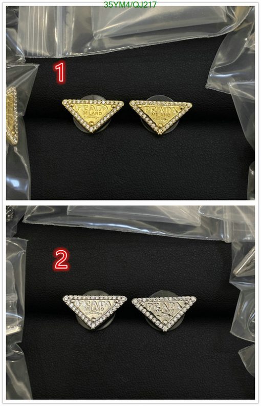 Gold and silver triangle fashion earrings on black background.