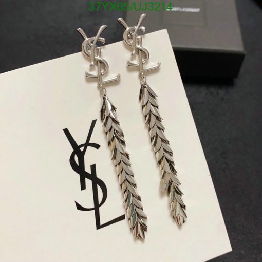 Designer leaf-style drop earrings on branded card