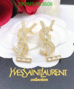 Gold logo earrings with rhinestones on white petals.