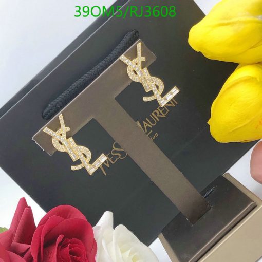 Designer earrings with logo, flowers, and packaging.