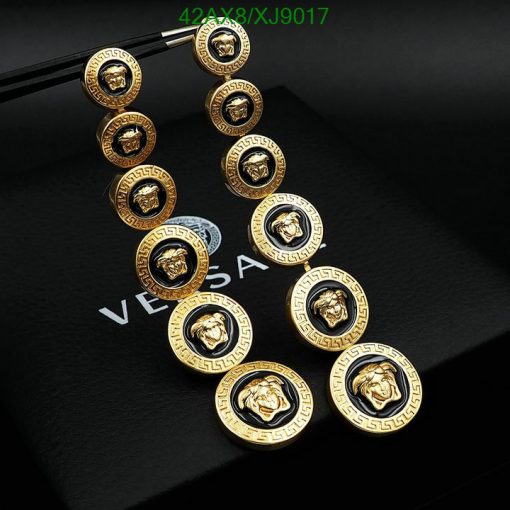 Luxury gold button accessories with lion motif design.