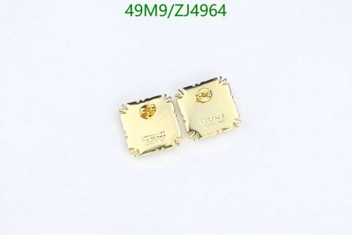 Gold square post earrings on white background.