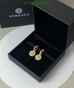 Versace earrings in open luxury box.