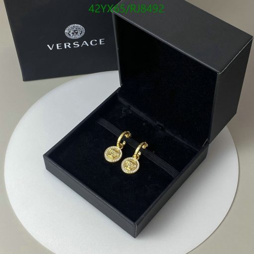 Versace earrings in open luxury box.