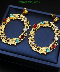 Gold bracelet with gemstones in presentation box