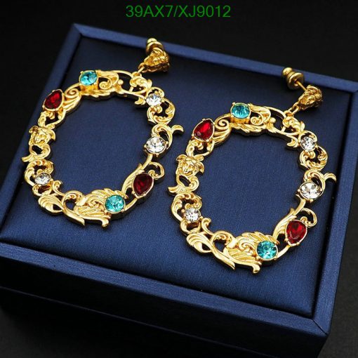 Gold bracelet with gemstones in presentation box