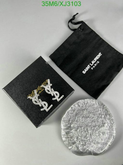 Saint Laurent earrings packaging and brand pouch.