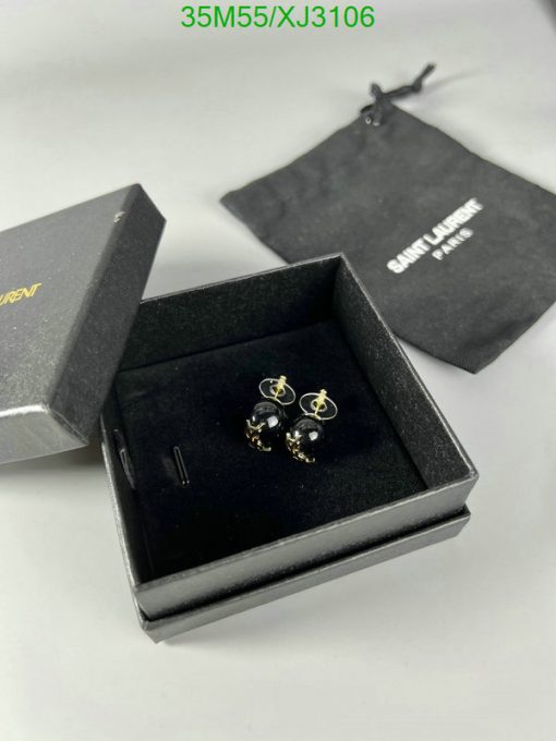 Saint Laurent earrings in open box with pouch.