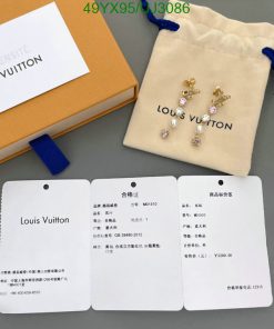 Louis Vuitton packaging and jewelry with price tags.