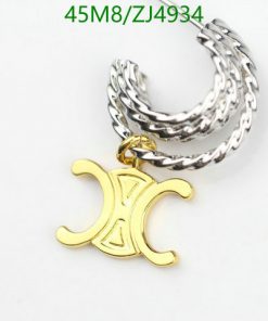 Gold-tone letter pendant with silver chain on white background.