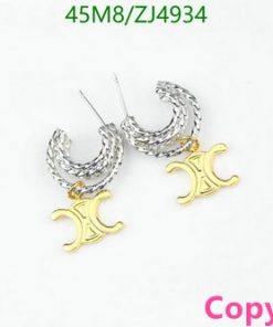 Designer-style gold and silver crescent earrings.