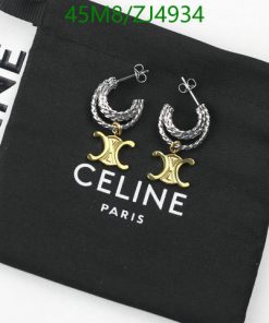 Designer earrings on branded black pouch.