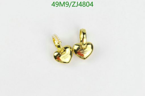 Gold heart-shaped earrings on white background.