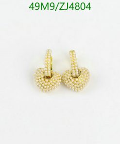 Gold heart-shaped stud earrings with diamonds.