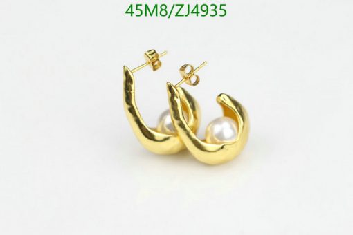 Gold pearl hoop earrings on white background.