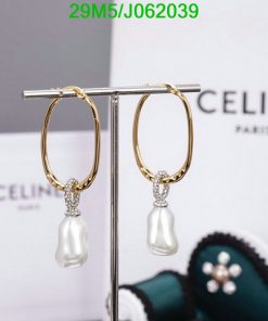 Elegant pearl drop earrings on display.