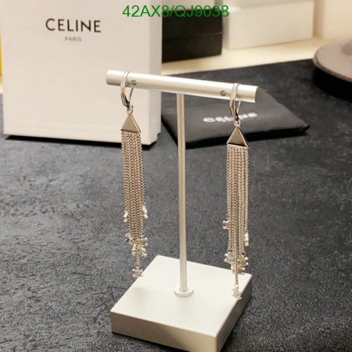 Silver tassel earrings on display stand.