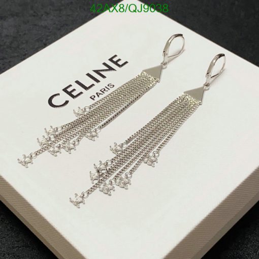 Silver tassel earrings on branded display card.