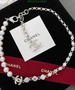 Designer pearl bracelet with brand ribbon.