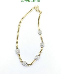 Gold and silver chain bracelet jewelry.