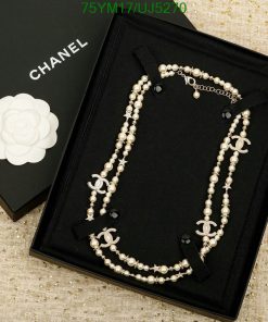 Chanel pearl necklace in black presentation box.