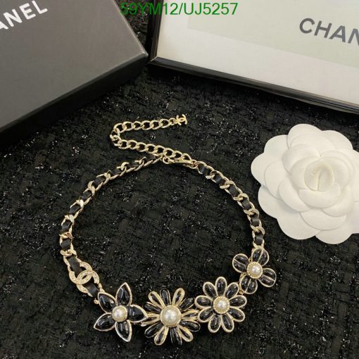 Chanel pearl flower necklace with box and camellia flower.