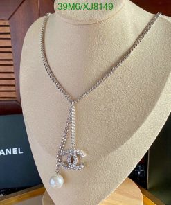 Elegant pearl pendant necklace on display.