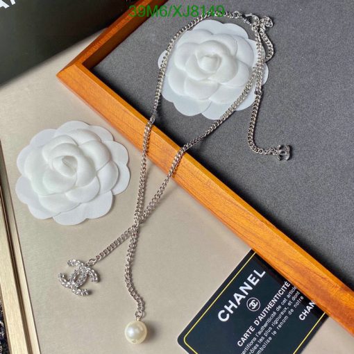 Designer necklace with pearl in presentation box.