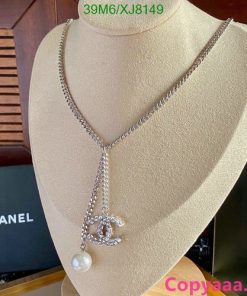 Chanel pearl pendant necklace on display