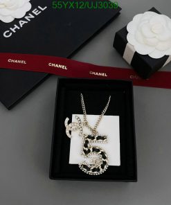 Chanel necklace with number 5 in presentation box.