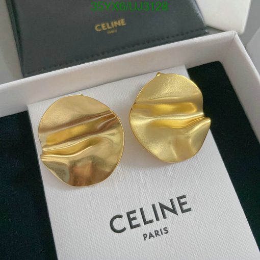 Celine gold wavy earrings on white display box.