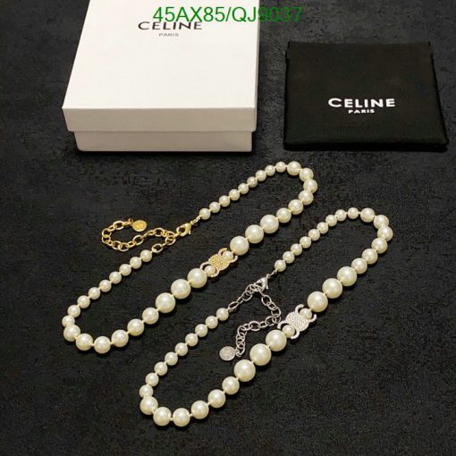 Celine pearl necklaces with box and pouch on black.