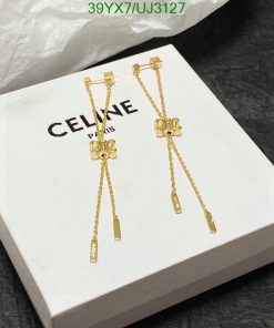 Celine gold bow earrings on box