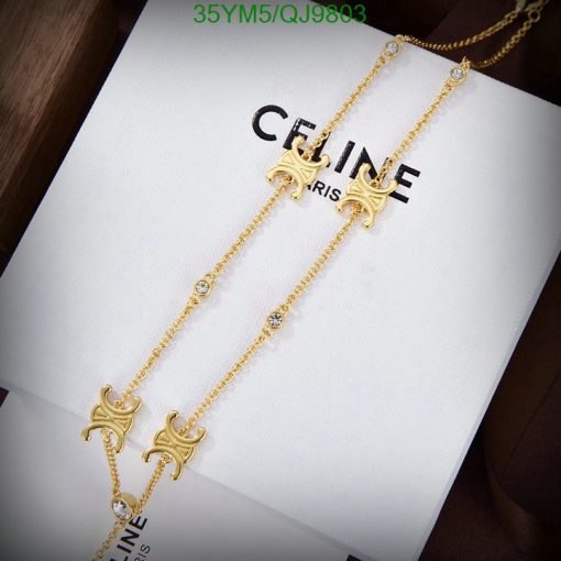 Celine gold pendant necklaces with logo detail.