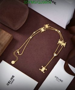 Elegant gold necklace displayed with luxury branding.