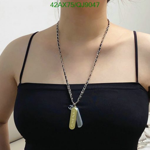 Woman wearing personalized pendant necklace.