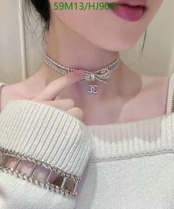 Woman wearing sparkling choker and bracelet