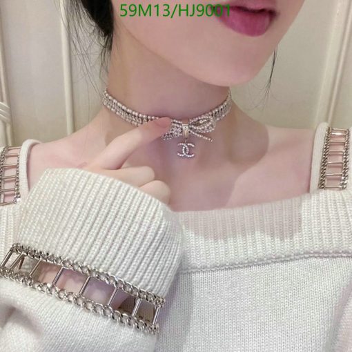 Woman wearing sparkling choker and bracelet