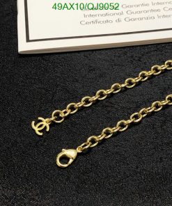 Gold chain with pendant and authenticity certificate.