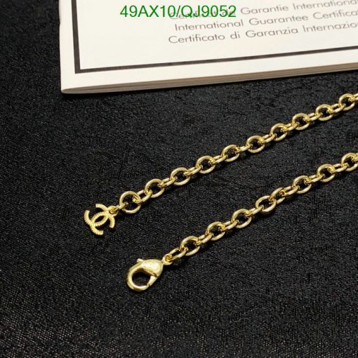 Gold chain with pendant and authenticity certificate.