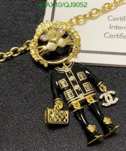 Gold and black pendant necklace with certificate.