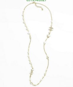 Gold chain necklace with pearls and star charms.