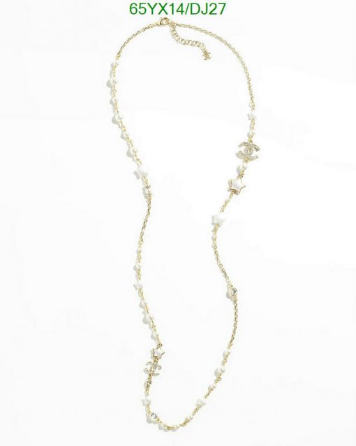 Gold chain necklace with pearls and star charms.