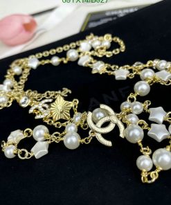 Elegant pearl and star charm gold bracelet jewelry.