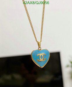 Gold chain with blue heart pendant.