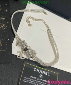 Chanel branded sparkling bow bracelet on presentation box.